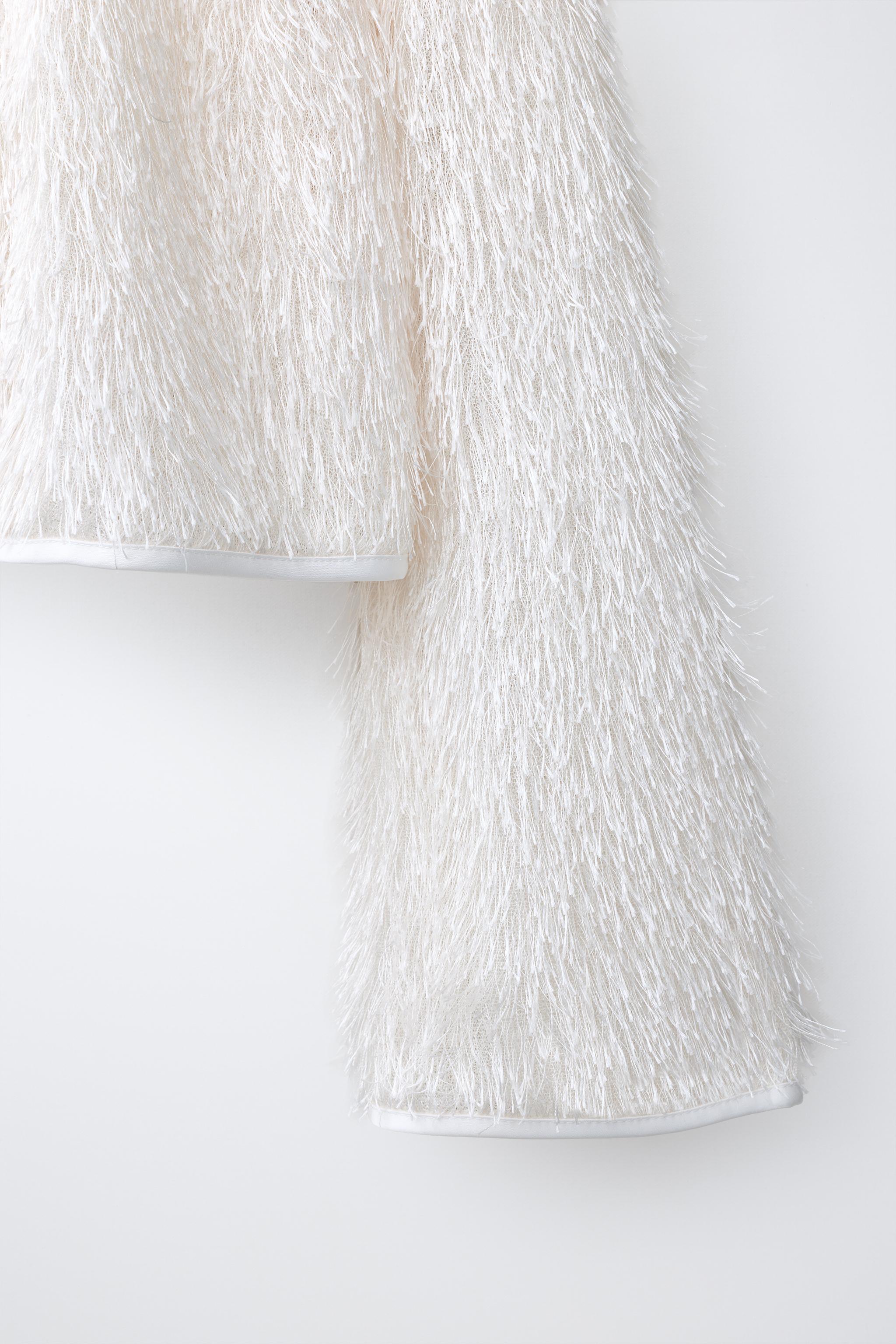 FRINGED JACKET